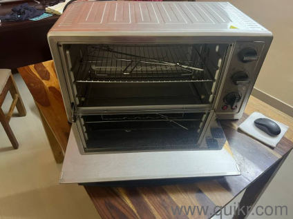  Morphy Richards 60-litre OTG (2000 watts).  It has a large capacity, and is suitable for baking, grilling, toasting.