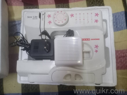 Usha Janome Wonder Stitch Automatic Zig-Zag Electric Sewing Machine (21 stitches, 860 SPM).