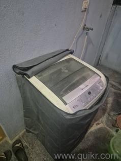 Washing machine with cover