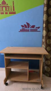 A compact computer table with Wheels