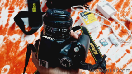 Nikon D3100 with Prime lense F- 1.4, 50mm in on sell.