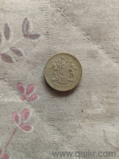 100 years old coins one pound 