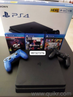 98732..73716 sony playstation ps4 pro 1tb with 2 controller all kit in warranty contect me 