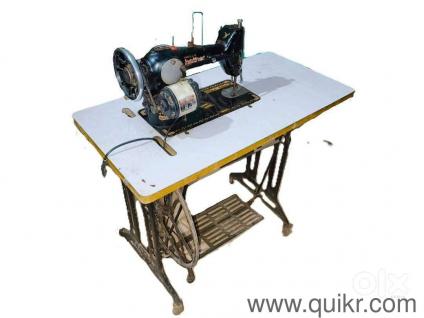 Salai machine (Sewing machine) with table (Paidaan) and motor with paddle.