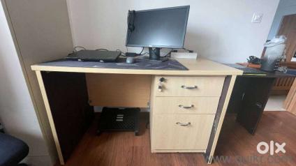 Selling a sturdy office table made of hardwood material, perfect for professional or home office use
