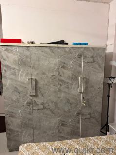 MOVING OUT SALE!! 1 year used furniture Selling a complete bedroom and living room furniture set including a bed with 2 side tables, 2 cupboards, a drawer unit, a swing, and a TV unit.