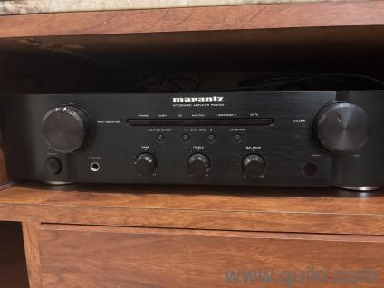 Marantz music system with one amplifier  two speakers one woofer speakers a