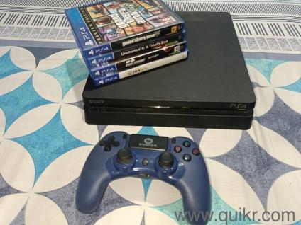 PS4 Slim with Evofox Elite play controller and Games