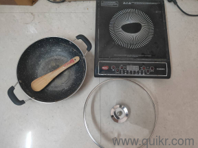 it is in very good condition and I am also providing the non stick kadai with it (1800W)