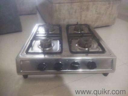stainless steel four burner gas stove, good condition, light weight, affordable price, decent look