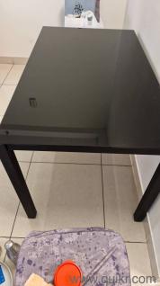 4 seater black glass dining table with chairs
