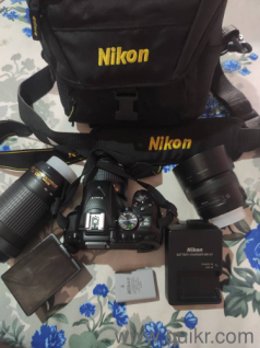 Nikon D5300 with prime lens and zoom akn kit lens 
