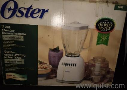 Oster brand new juicer and blender 450 watts easy clean feature ice crushing power