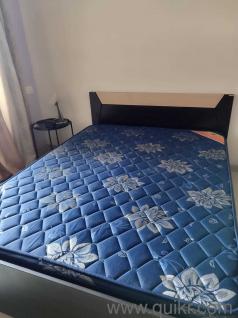 Strong engineered wooden bed with storage