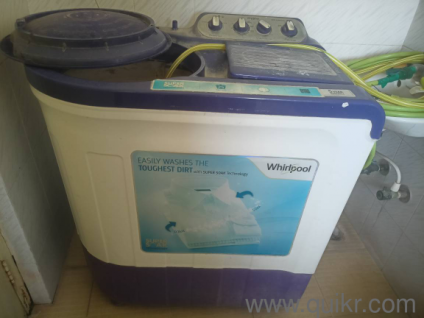 whirlpool washing machine with both washing and drying option in almost new condition 