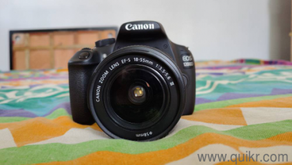canon 1200d with kit lens, bag and strap