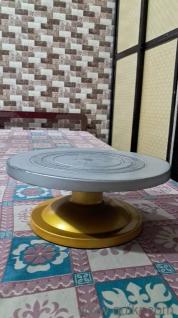 Cake decorating turntable available for sale.Smooth rotation, perfect for icing and cake decoration.Condition is good and fully working.
