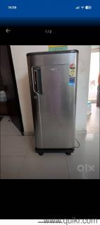 Whirlpool refrigerator (Model: DC 205 F). It is a reliable, energy-efficient unit perfect for a small family or bachelor setup.