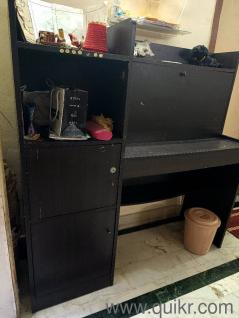 Dark-brown study table with closed-chambers