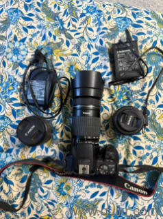 Camera body with 18-55mm, 55-250mm and 50mm lenses.All original accessories included.Excellent condition, very less used.Reason for selling: Need funds.Genuine product.