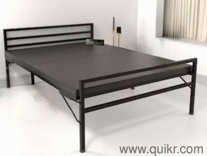 double iron bed, cubboard with lock and table including all