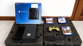 Playstation 4 Fat 1Tb ,External 1tb drive, added total 20 games,3 games physical disc,1 fifa theme controller and am owner