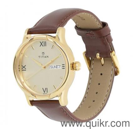 Titan analog day and date watch