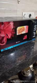 urgently selling koryo 25litres convection microwave oven 5 years old only. selling in a week. 
