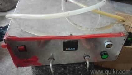 liquid filling machine     and uses sewing machine good condition 