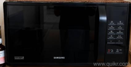Samsung Solo Microwave Oven  23 Litre (Like new, purchased 4 months ago, no use.)