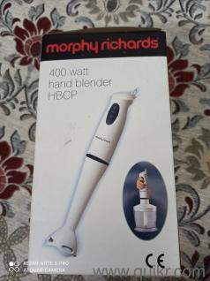 brand new 400 watt hand blender with detachable leg for easy cleaning. along with chopper attachment and measurable beaker. 