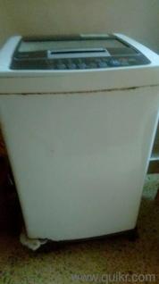LG washing machine top load fully automatic with several functions in working condition