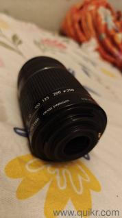 three canon ef lenses 