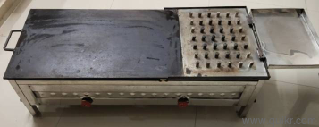 Commercial gas stove with a flat tawa and a multi-nozzle burner section - size 12 inch  48 inch