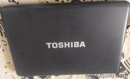 Toshiba (i5) laptop., 4gb ram, 500gb hdd, dvd writer with charger.